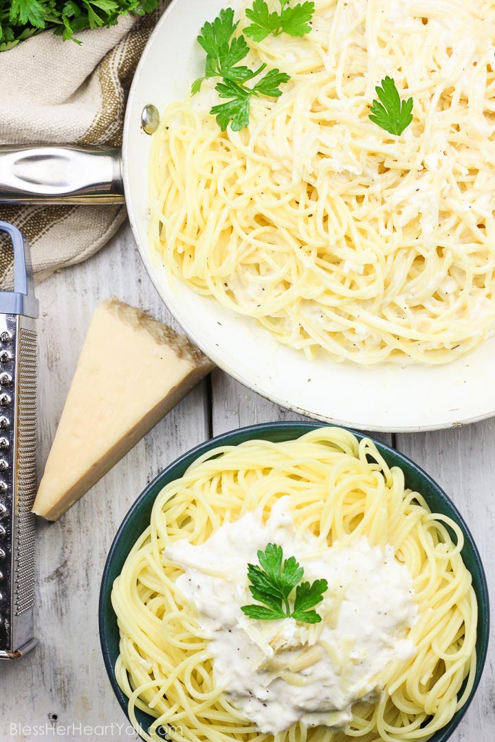 This Skinny Champagne Alfredo recipe is amazing and quick to make! Instead of those heavy unhealthy creams, healthy greek yogurt is used! And if we needed a reason to use up extra New Year's Eve champagne, here it is! It is used in lieu of chicken broth or white wine in the typical alfredo sauce! Cream, healthy, fun deliciousness! www.blessherheartyall.com