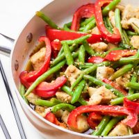 This 30 minute coconut sesame chicken and green beans skillet is a tasty and fresh dish that combines coconut oil, fresh honey, chili flakes, and garlic and then drizzled over fresh chicken and green beans and baked to tender perfection!