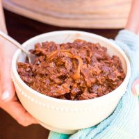 This gluten-free bourbon bbq shredded beef recipe is a magical combination of juicy beef in a garlic and onion barbecue sauce, placed in your slow cooker along with a dash of bourbon, and ready for your enjoyment after a busy day!