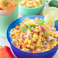 This easy mexican chopped corn salad combines fresh chopped summer veggies with a garlicky coconut lime vinaigrette and is a quick and refreshing dish for any warm-weathered gathering!