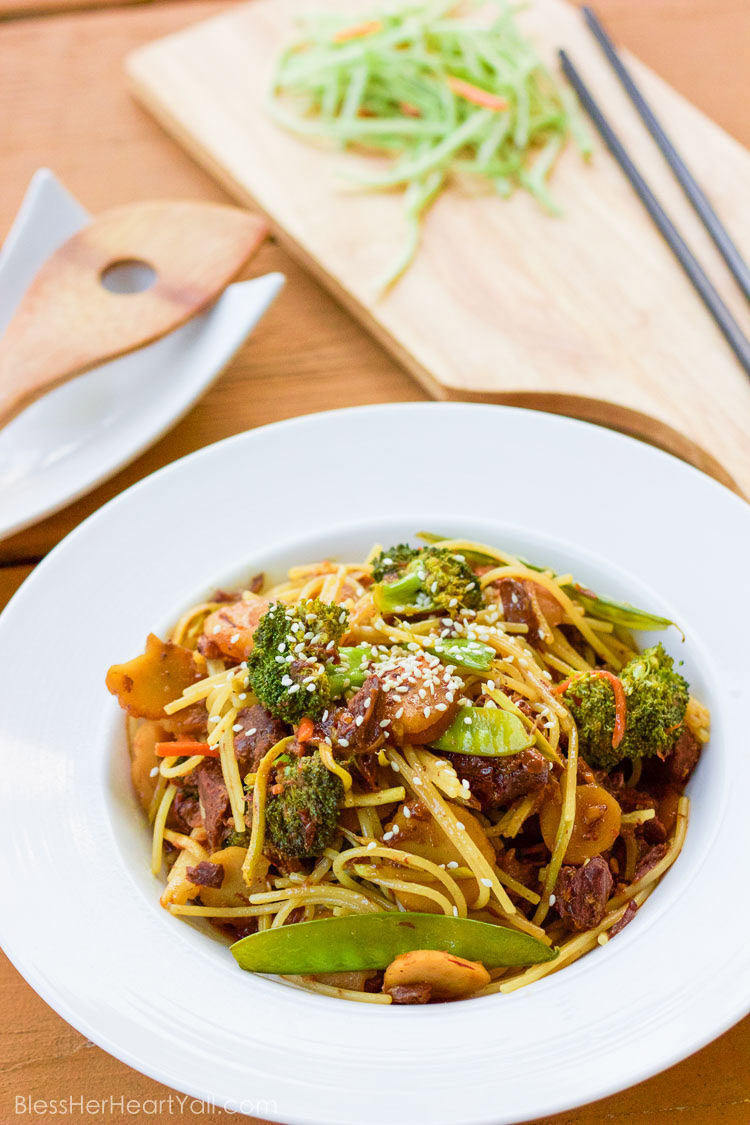 This slow cooker beef lo mein tosses budget-friendly pieces of beef into an easy asian-inspired sauce and turns in into a delicious spicy garlicky noodle-y gluten-free dish that's perfect for those busy weeknights!