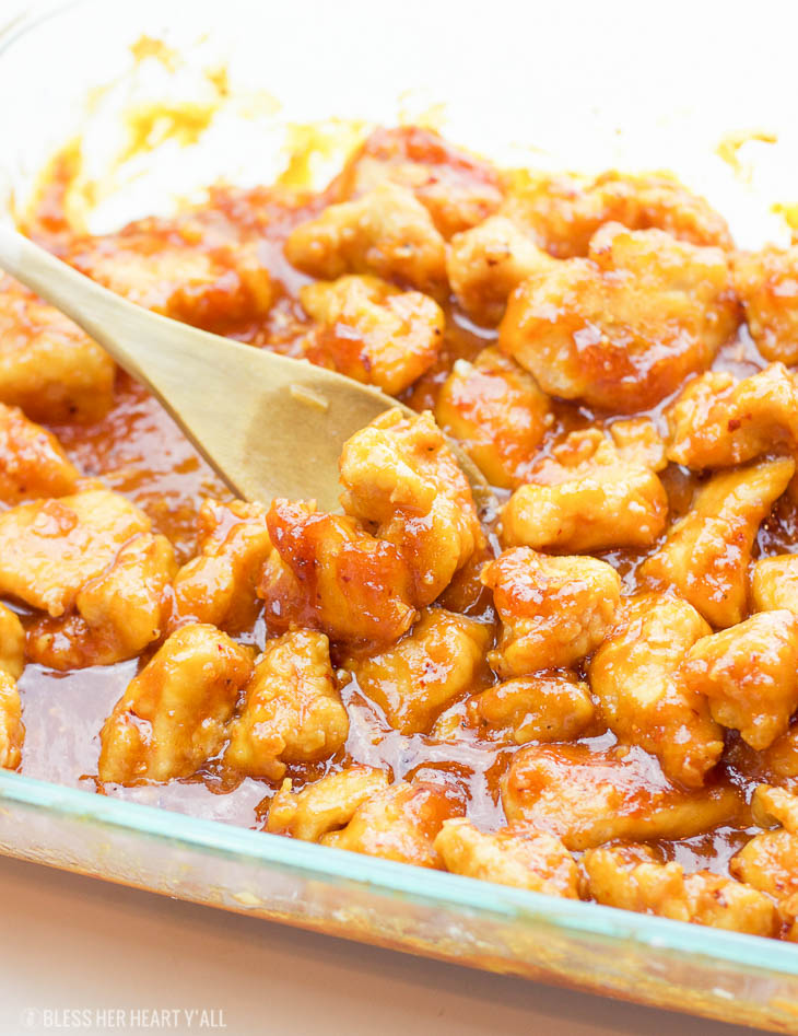 This one-pan baked gluten-free sweet and sour chicken recipe is 100% gluten-free and not fried in a frying pan for even a second. Tender pieces of chicken are lightly breaded in a homemade spiced coating and then drizzled in coconut oil and a sweet and tangy sticky sauce and then baked to perfection.