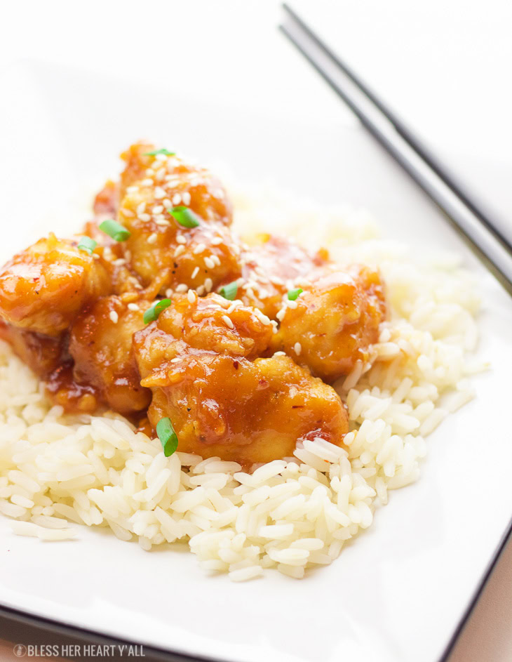 This one-pan baked gluten-free sweet and sour chicken recipe is 100% gluten-free and not fried in a frying pan for even a second. Tender pieces of chicken are lightly breaded in a homemade spiced coating and then drizzled in coconut oil and a sweet and tangy sticky sauce and then baked to perfection.