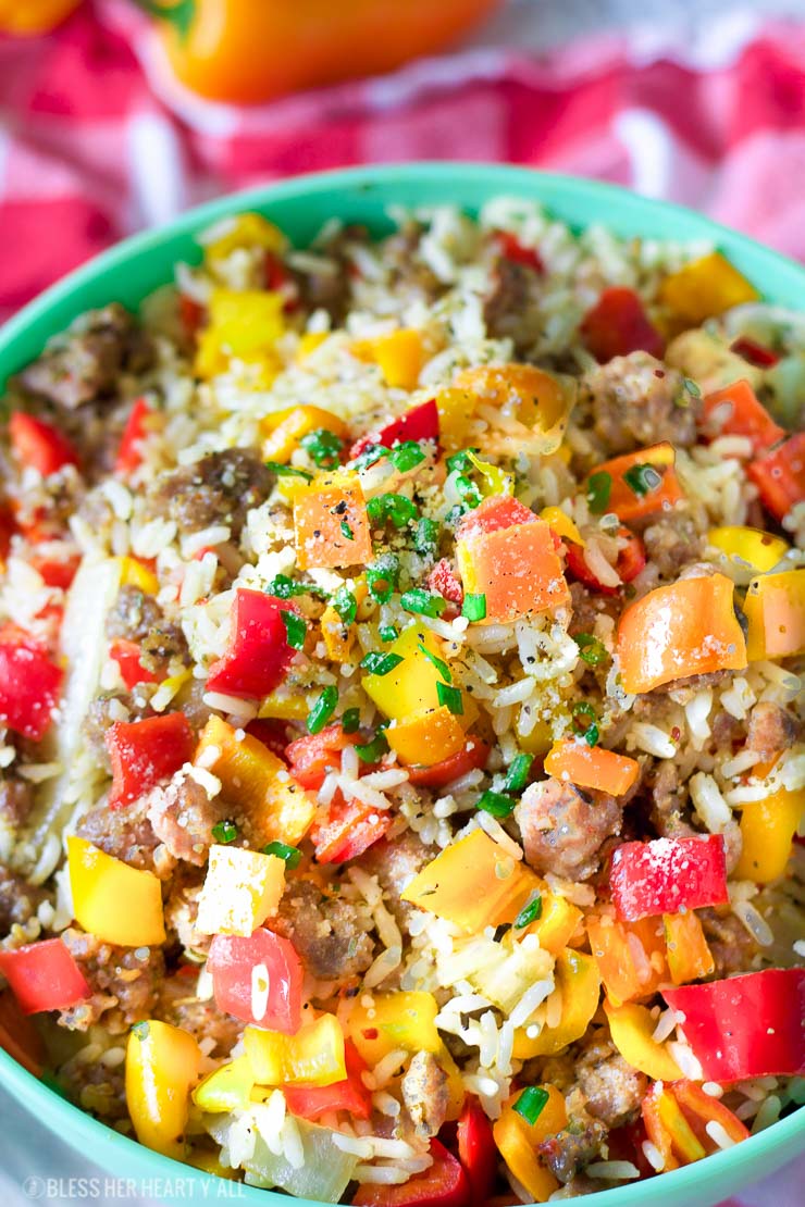 This gluten-free chopped stuffed pepper salad combines spicy sausage with fresh diced bell peppers and sweet onion, fluffy rice, and is seasoned with a combination of sizzling creole spices for one salad that is burst with flavor spoonful after spoonful!