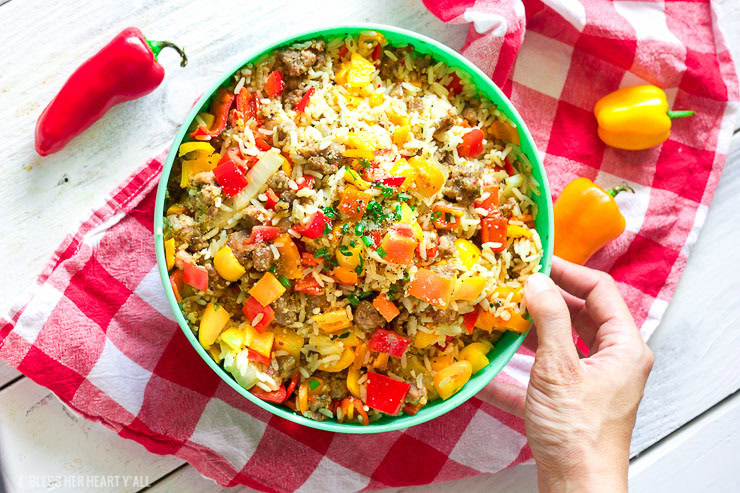 This gluten-free chopped stuffed pepper salad combines spicy sausage with fresh diced bell peppers and sweet onion, fluffy rice, and is seasoned with a combination of sizzling creole spices for one salad that is burst with flavor spoonful after spoonful!