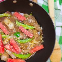 This simple watermelon stir-fry recipe combines the sweet refreshing flavors of juicy ripe watermelon with the savoury flavors of the asian-inspired stir-fry! The perfect-for-summer sauce has just a touch of sweet and light with it's combination of fresh lime juice and garlic. This summer dish definitely won't weigh you down in the sizzling heat!