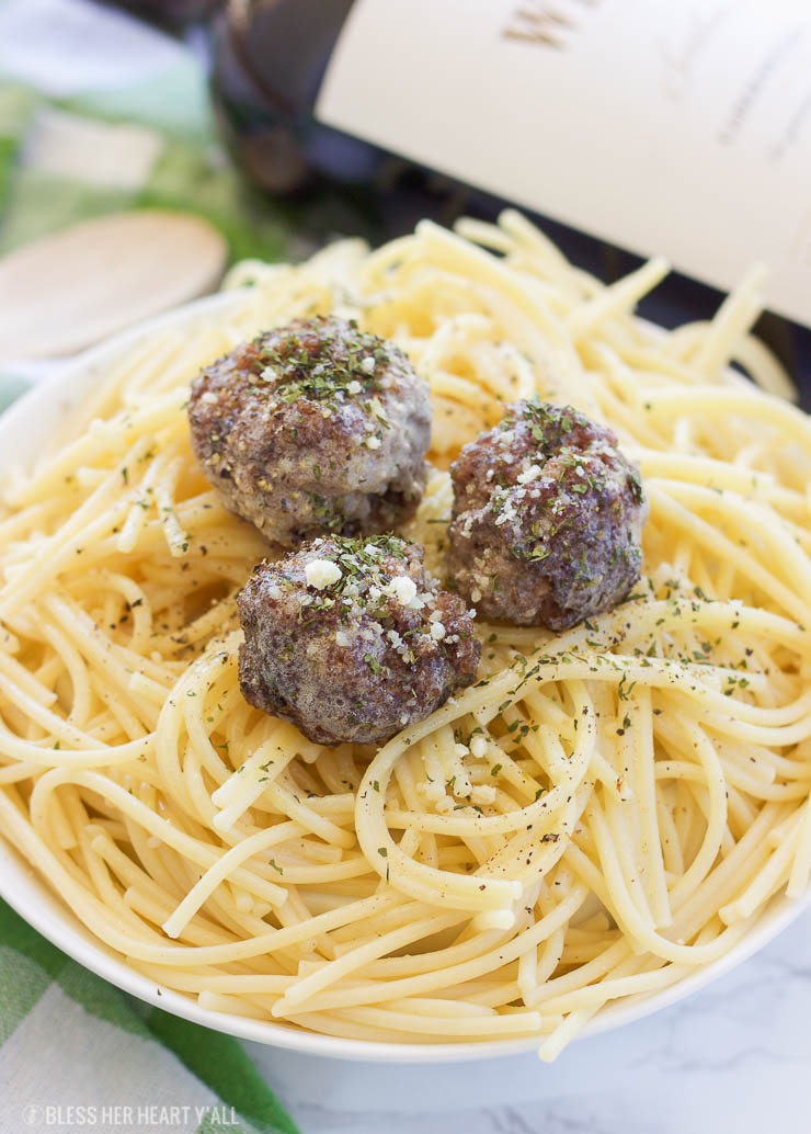 These simple oven baked paleo meatballs are the bomb! Okay but seriously, just combine some grass-fed beef with garlic, onion, egg, liquid aminos, and a little bit of salt and pepper. Roll them up and toss them in the oven for a few minutes and your family will have a whole mess of juicy paleo, gluten-free, and grain-free meatballs!