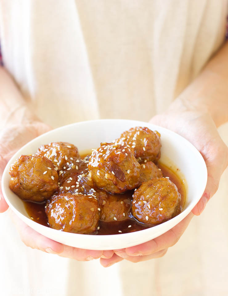 This 3-hour slow cooker honey peach chipotle meatballs are an easy sweet and spicy appetizer that's both gluten-free and paleo-friendly. Grab some honey, peaches, and spices and dig in!