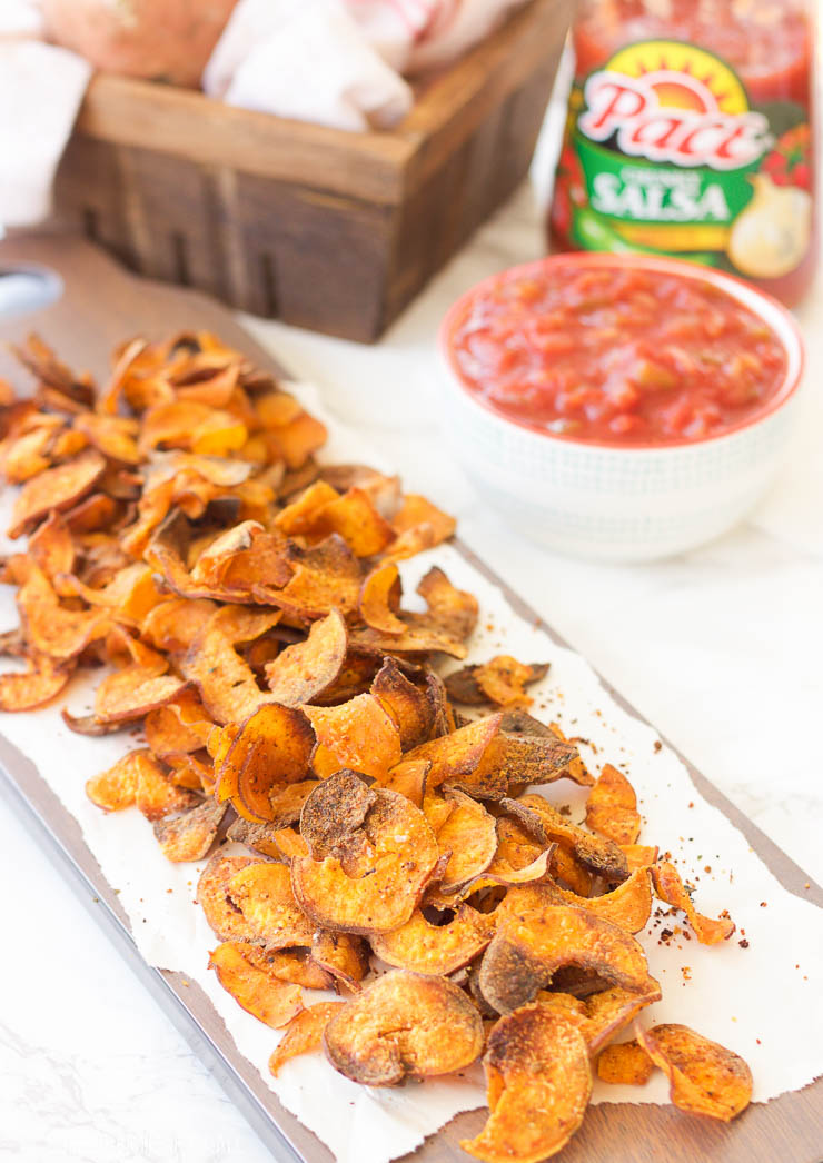 Easy spicy garlic sweet potato chips are a crunchy dippable snack that's both a touch sweet, a bit spicy, and completely addicting.