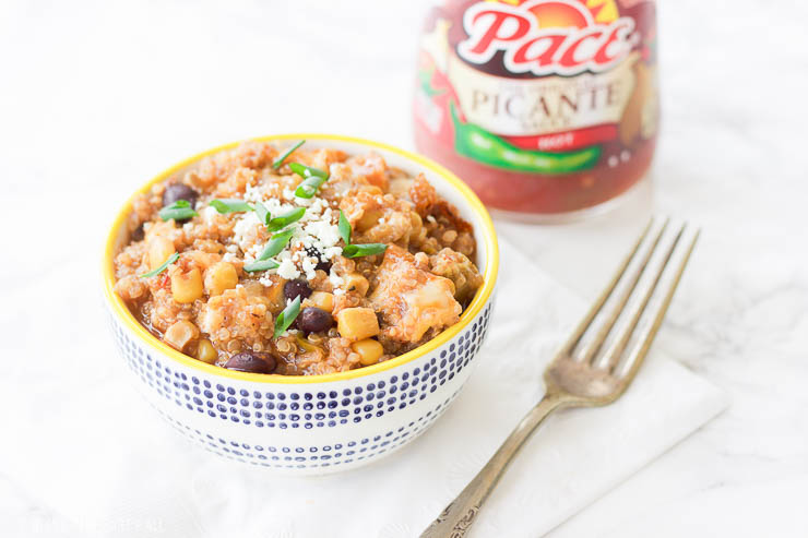 This slow cooker mexican quinoa dip is the perfect gluten-free, vegetarian, and paleo friendly tailgating comfort food! It's warm and gooey, filling and nutritious, and cooks itself in the slow cooker for a quick 2-3 hours. Use this recipe as a dip with your favorite sweet potato chips, rolled up in a tortilla for a quick enchilada, or toss it over a salad to add a burst of flavor!