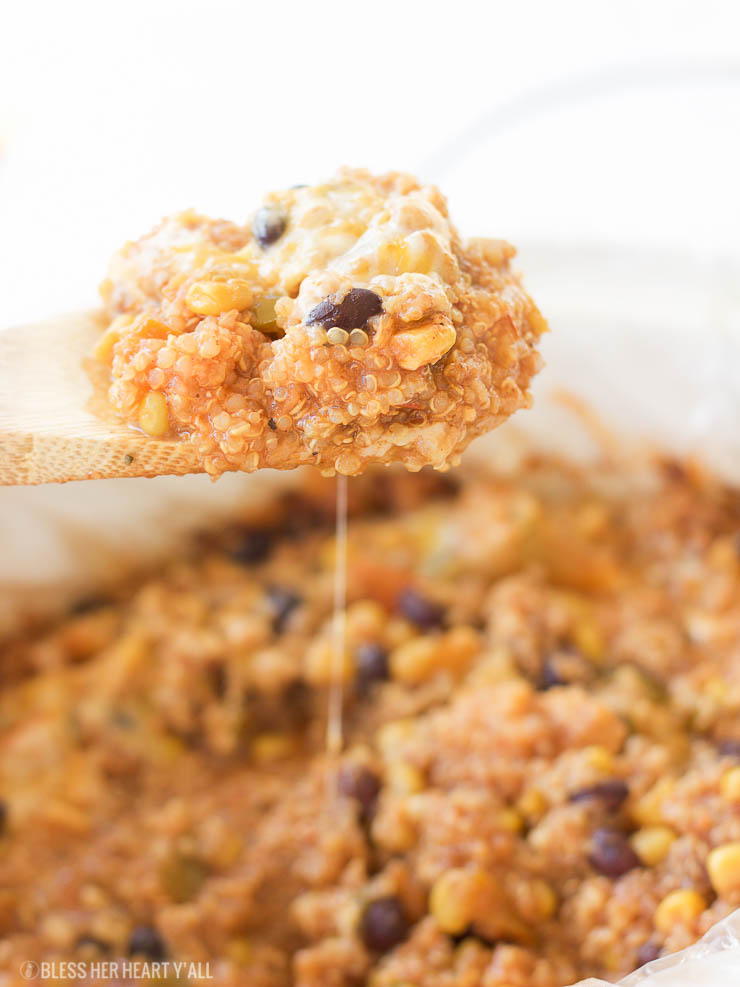 This slow cooker mexican quinoa dip is the perfect gluten-free, vegetarian, and paleo friendly tailgating comfort food! It's warm and gooey, filling and nutritious, and cooks itself in the slow cooker for a quick 2-3 hours. Use this recipe as a dip with your favorite sweet potato chips, rolled up in a tortilla for a quick enchilada, or toss it over a salad to add a burst of flavor!