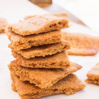 Paleo Gluten-Free Graham Crackers || These paleo gluten-free graham crackers are an easy 15 minute recipe that uses simple ingredients to make moist on the inside and toasted on the outside squares just in time for s'more season! www.BlessHerHeartYall.com