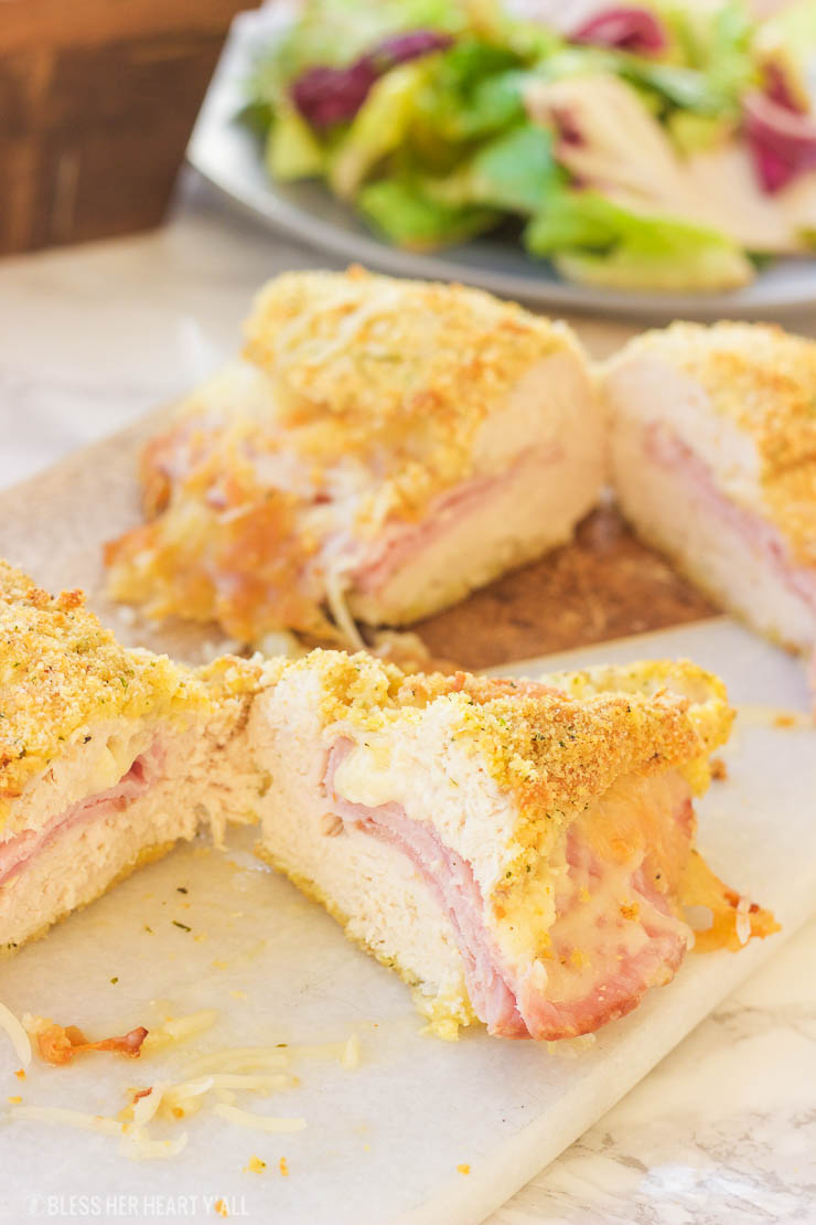 This gluten-free chicken cordon bleu recipe is both quick and easy. Crunchy outer coating and juicy chicken in the middle, all topped with warm ham and ooey gooey melted swiss cheese! www.blessherheartyall.com