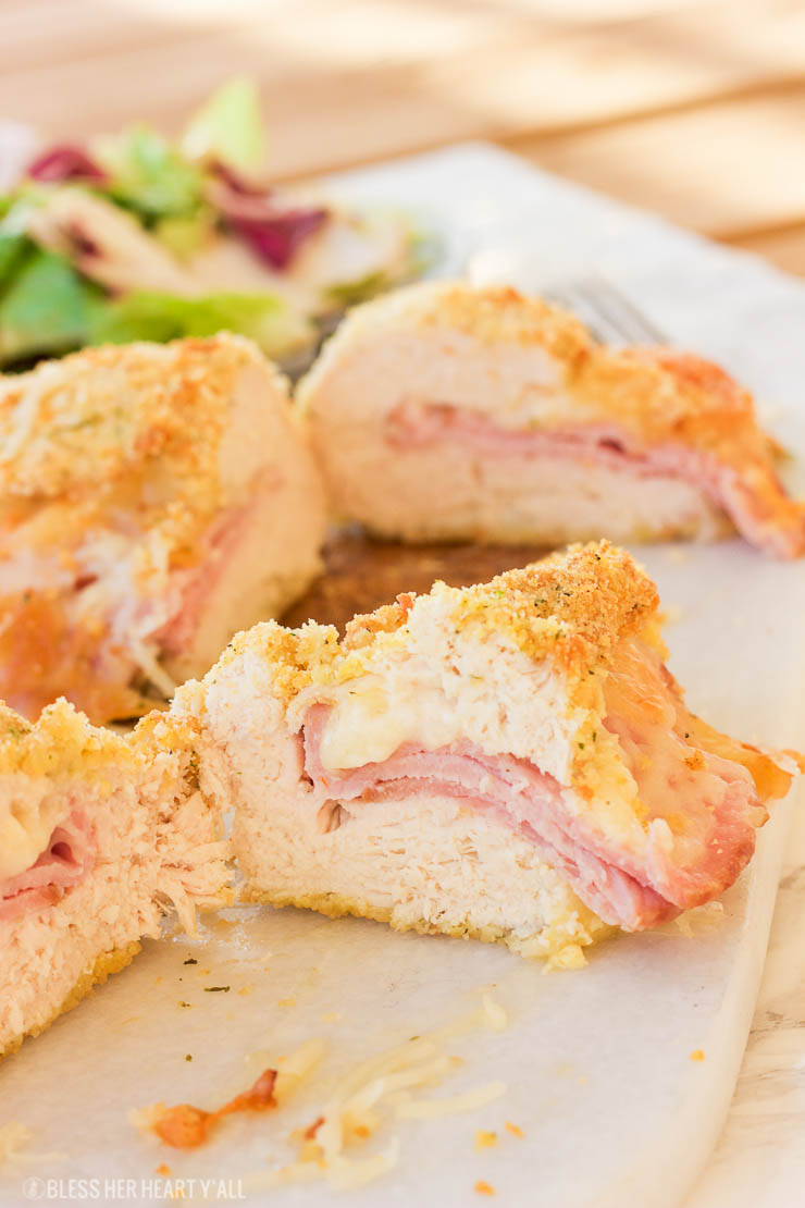 This gluten-free chicken cordon bleu recipe is both quick and easy. Crunchy outer coating and juicy chicken in the middle, all topped with warm ham and ooey gooey melted swiss cheese! www.blessherheartyall.com