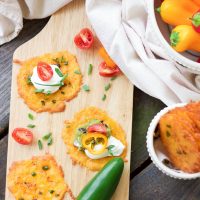 Taco cheese crisps are an easy and quick baked party recipe! These crispy cheese dippers are the perfect appetizer or snack for any gluten-free or low carb munchers and are huge hits at tailgating parties! All you need is cheddar cheese, taco seasoning, your favorite taco toppings, and a few minutes of oven time! Yes!