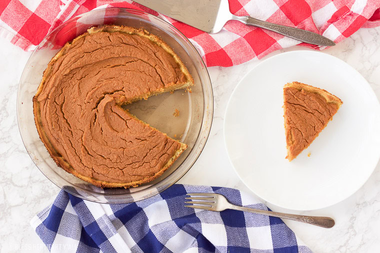 This paleo sweet potato pie is made with simple healthy ingredients and is both decadent and smooth. This southern treat is also gluten free, grain free, and dairy free! Bring on the holidays with this easy recipe y'all! www.blessherheartyall.com