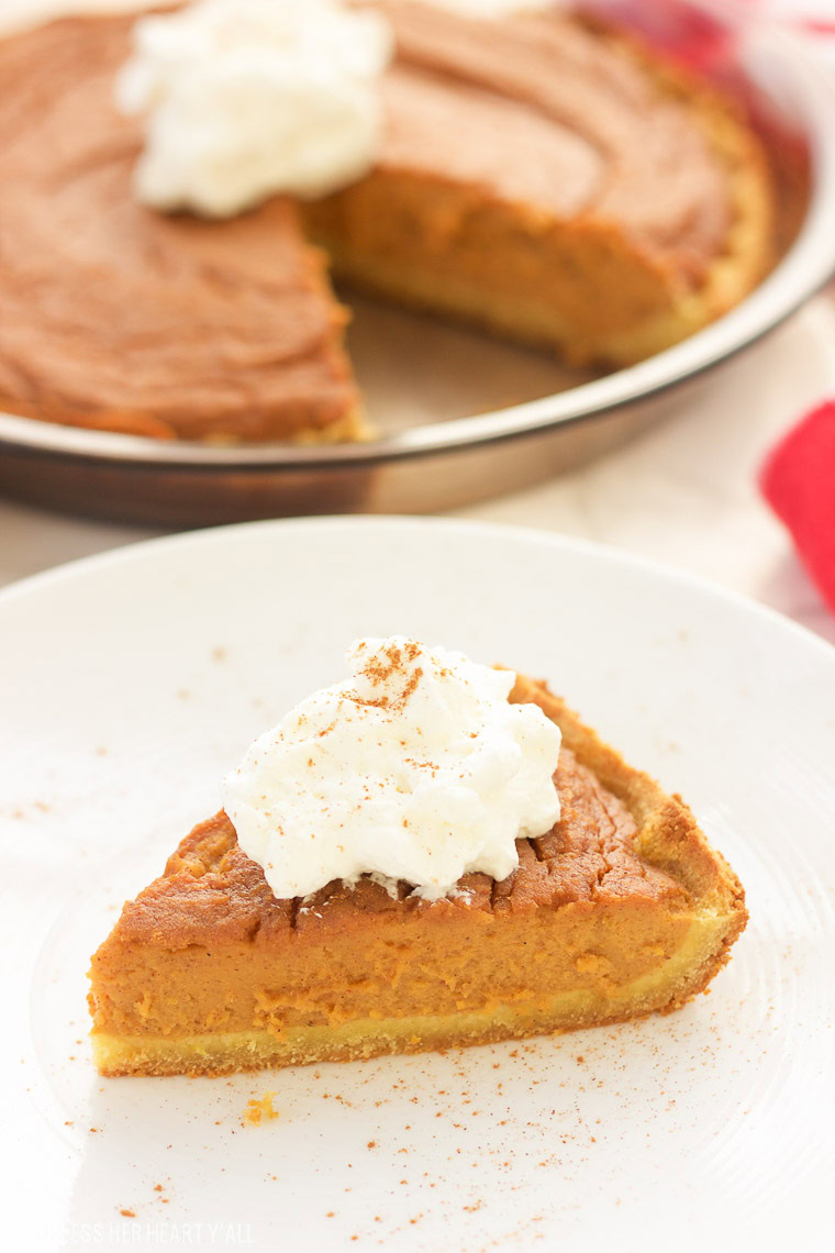 This paleo sweet potato pie is made with simple healthy ingredients and is both decadent and smooth. This southern treat is also gluten free, grain free, and dairy free! Bring on the holidays with this easy recipe y'all! www.blessherheartyall.com