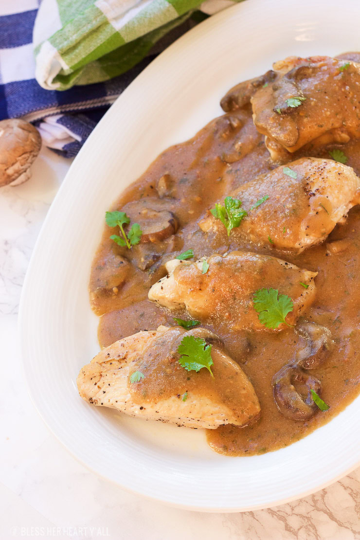 This one-pot garlic mushroom chicken skillet cooks juicy chicken breasts and uses the drippings to make a quick creamy garlic mushroom gravy. The thick savory sauce brings out a cozy warm flavor to this comfort food, perfect for when you only have 20 minutes to spare!