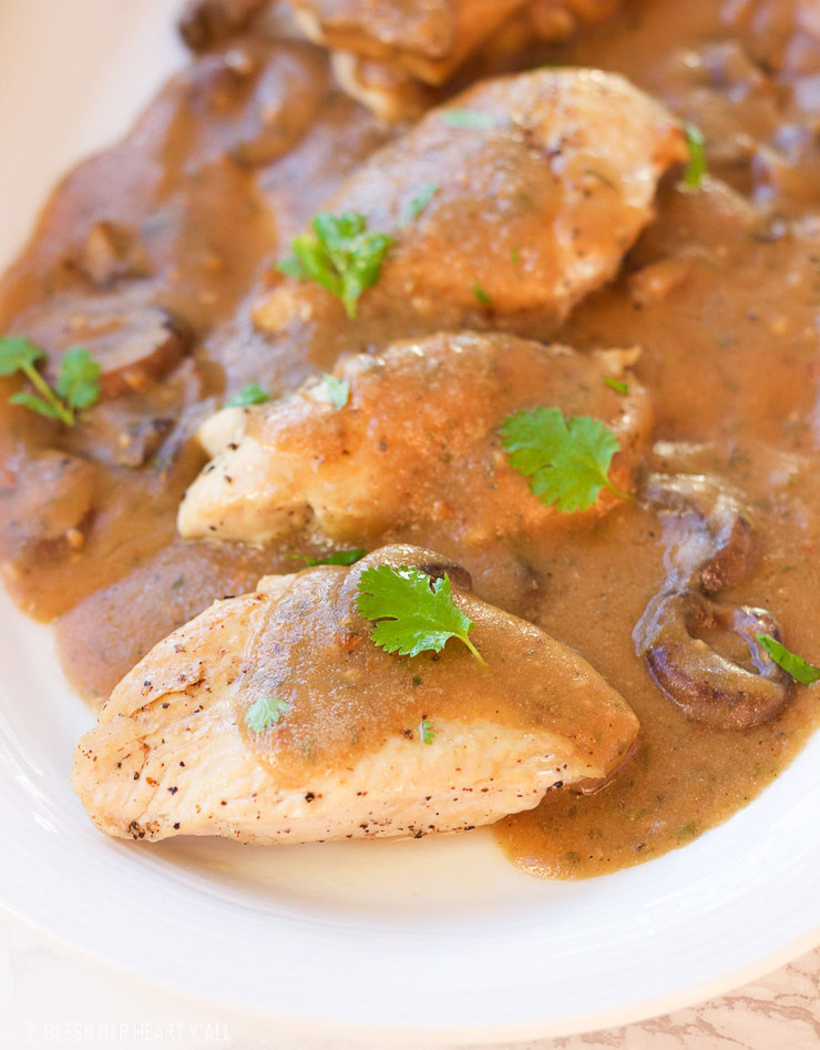 This one-pot garlic mushroom chicken skillet cooks juicy chicken breasts and uses the drippings to make a quick creamy garlic mushroom gravy. The thick savory sauce brings out a cozy warm flavor to this comfort food, perfect for when you only have 20 minutes to spare!