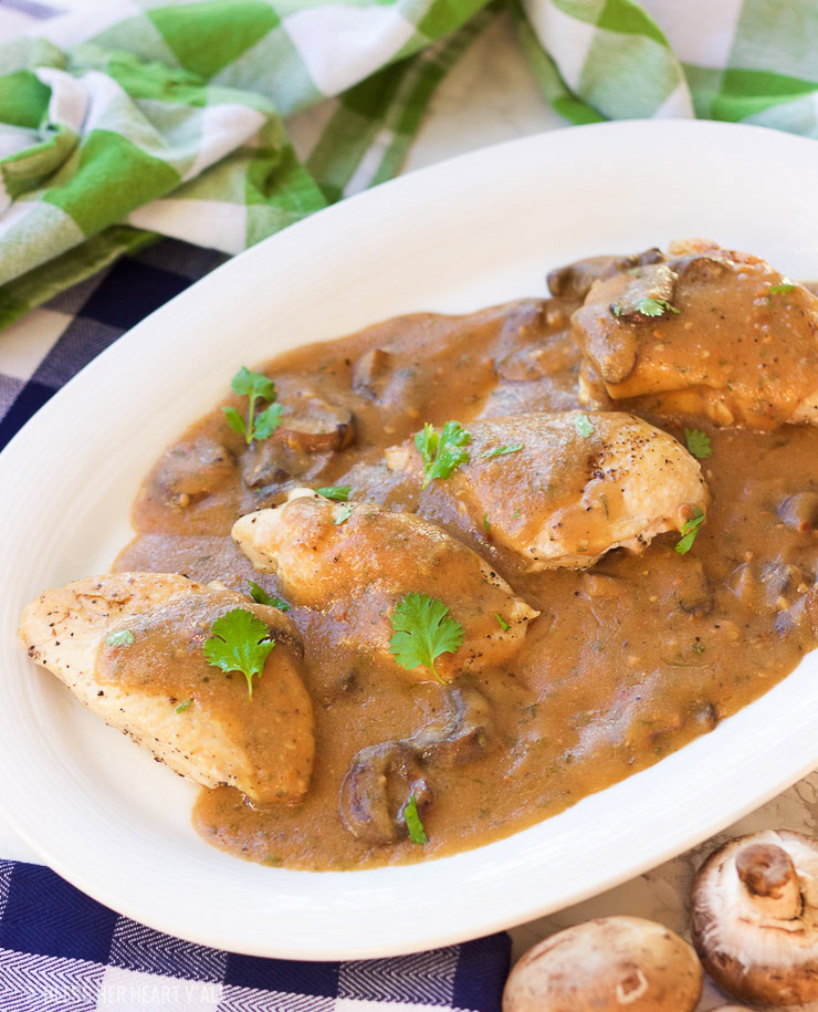 This one-pot garlic mushroom chicken skillet cooks juicy chicken breasts and uses the drippings to make a quick creamy garlic mushroom gravy. The thick savory sauce brings out a cozy warm flavor to this comfort food, perfect for when you only have 20 minutes to spare!