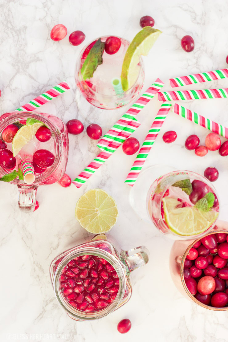 This pomegranate cranberry mojito recipe tastes just as it looks - juicy, sweet, refreshing, and light! With only a few simple ingredients, these cocktails are perfect for your winter holiday parties and for ringing in the new year!