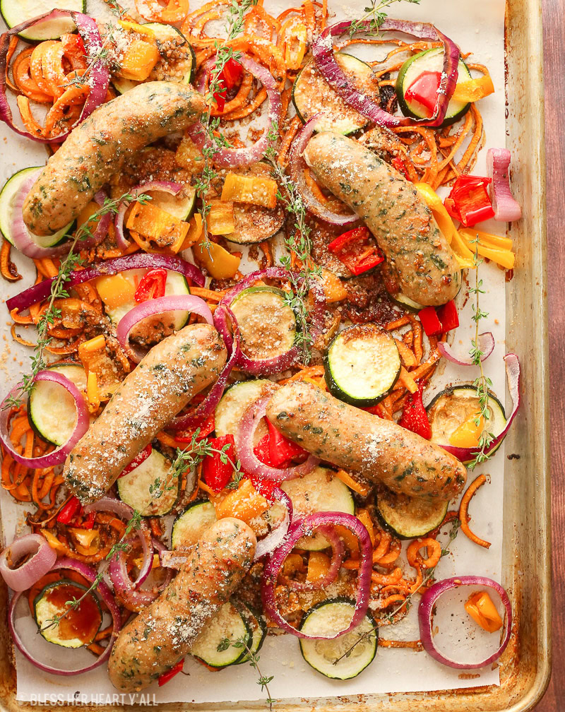 This sheet pan balsamic parmesan chicken sausage dinner is as easy to prepare as it is warm and savory. Healthy vegetables and gluten free chicken sausages are drizzled in a sweet and savory balsamic parmesan sauce then roasted to juicy perfection. The fanciest sausages you'll ever eat are easier than you think to make!