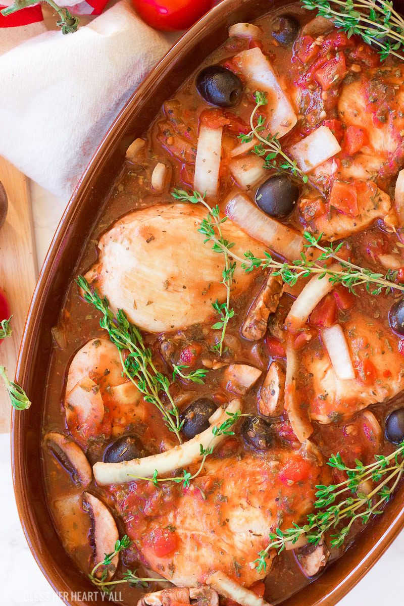 This gluten free slow cooker chicken cacciatore is a healthy dish that is prepped in under 10 minutes and slowly simmers all day in it's fragrant italian-inspired juices, filling your home with it's sweet garlicky and thyme aromas. It also has paleo and dairy-free options. This is the hearty, warm, juicy all-in-one meal that you've been waiting for!