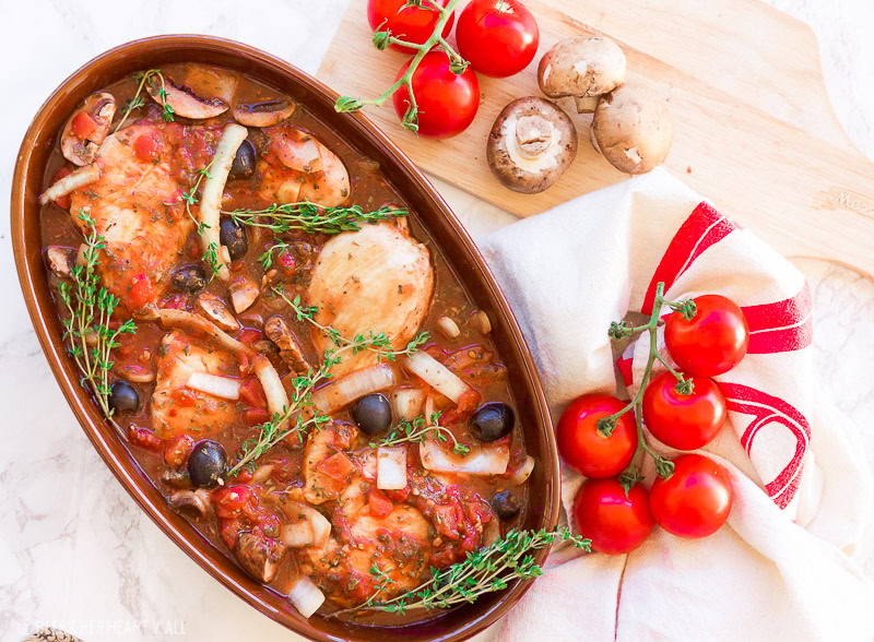 This gluten free slow cooker chicken cacciatore is a healthy dish that is prepped in under 10 minutes and slowly simmers all day in it's fragrant italian-inspired juices, filling your home with it's sweet garlicky and thyme aromas. It also has paleo and dairy-free options. This is the hearty, warm, juicy all-in-one meal that you've been waiting for!