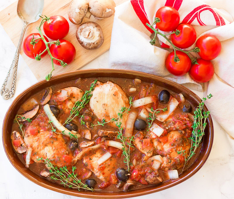 This gluten free slow cooker chicken cacciatore is a healthy dish that is prepped in under 10 minutes and slowly simmers all day in it's fragrant italian-inspired juices, filling your home with it's sweet garlicky and thyme aromas. It also has paleo and dairy-free options. This is the hearty, warm, juicy all-in-one meal that you've been waiting for!