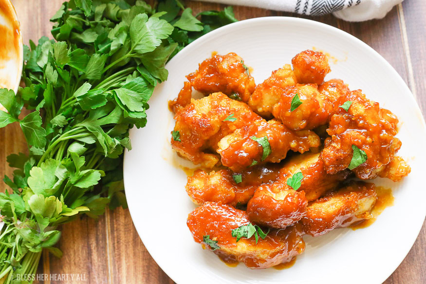 Georgia Gold Chicken Recipe is both gluten free and completely baked and is KFC Inspired. Lightly breaded chicken pieces are dunked in a Georgia honey barbeque sauce and then baked to perfection!