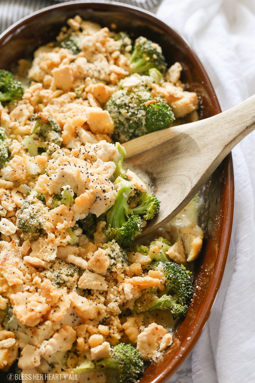 A skinny gluten free chicken poppy seed casserole that combines juicy chicken and fresh broccoli pieces in a homemade healthy poppyseed cream sauce, topped with butter toasted cracker crumbles, and baked to golden perfection in 15 minutes!