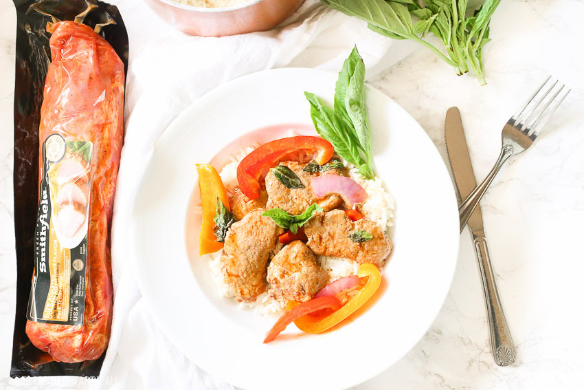 Tender juicy pork loin is cooked in a skillet with fresh vegetables and finished in an easy thai basil sauce all in under 30 minutes! This thai basil pork skillet is the perfect quick and easy weeknight meal that the whole family will love!