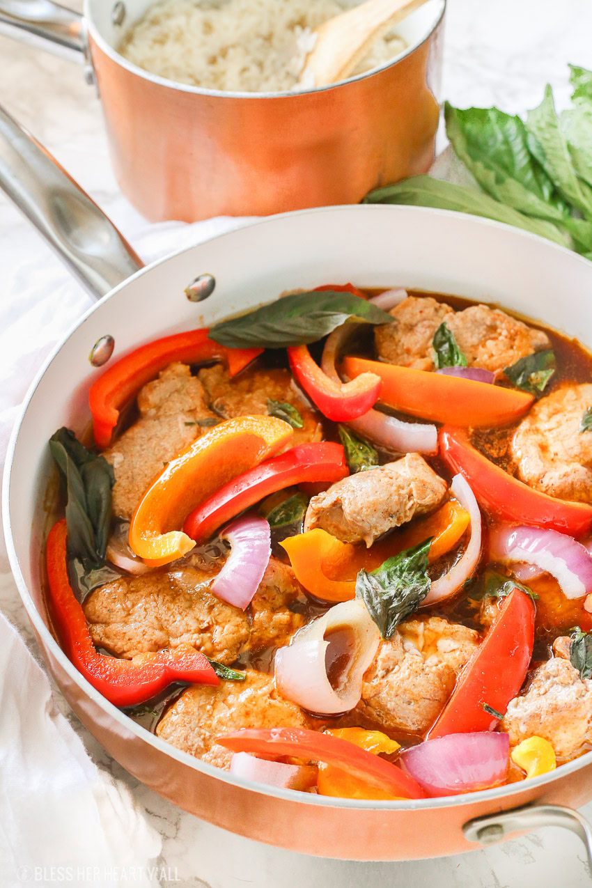 Tender juicy pork loin is cooked in a skillet with fresh vegetables and finished in an easy thai basil sauce all in under 30 minutes! This thai basil pork skillet is the perfect quick and easy weeknight meal that the whole family will love!