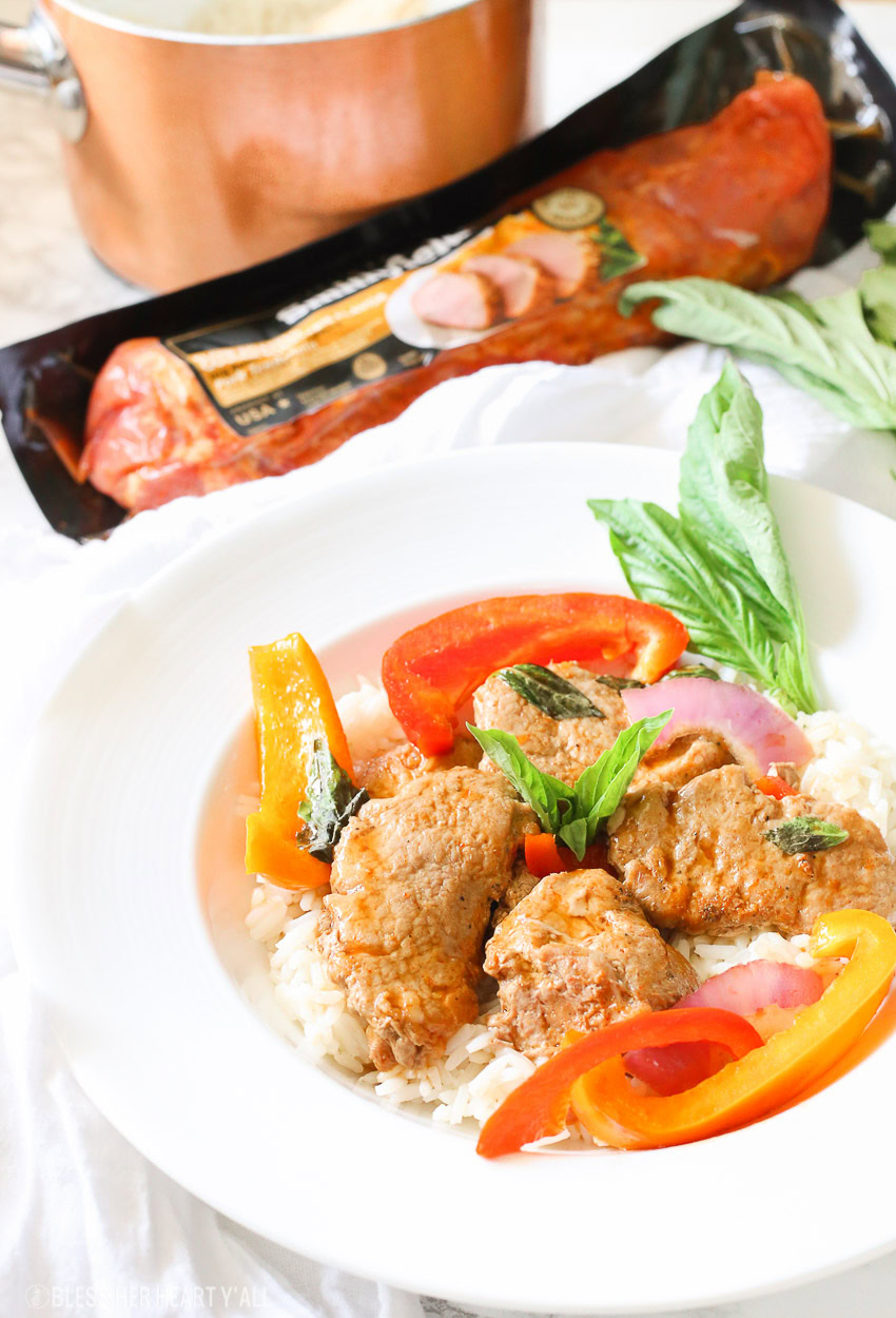 Tender juicy pork loin is cooked in a skillet with fresh vegetables and finished in an easy thai basil sauce all in under 30 minutes! This thai basil pork skillet is the perfect quick and easy weeknight meal that the whole family will love!