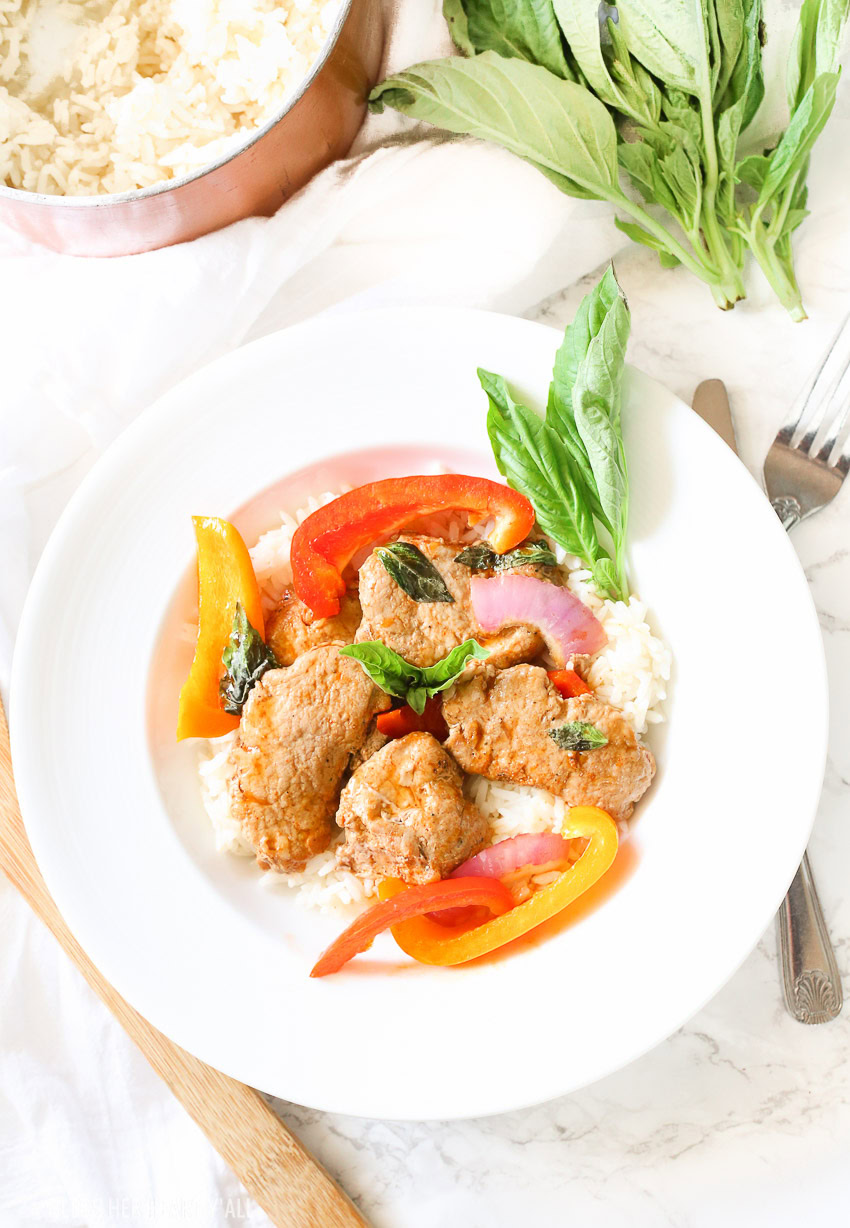 Tender juicy pork loin is cooked in a skillet with fresh vegetables and finished in an easy thai basil sauce all in under 30 minutes! This thai basil pork skillet is the perfect quick and easy weeknight meal that the whole family will love!