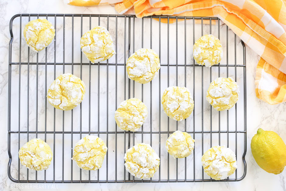 Gluten free lemon crinkle cookies combine light fresh lemon flavors into soft and doughy cookies that are sprinkled in delicious powdered sugar before being baked for a quick 10 minutes!