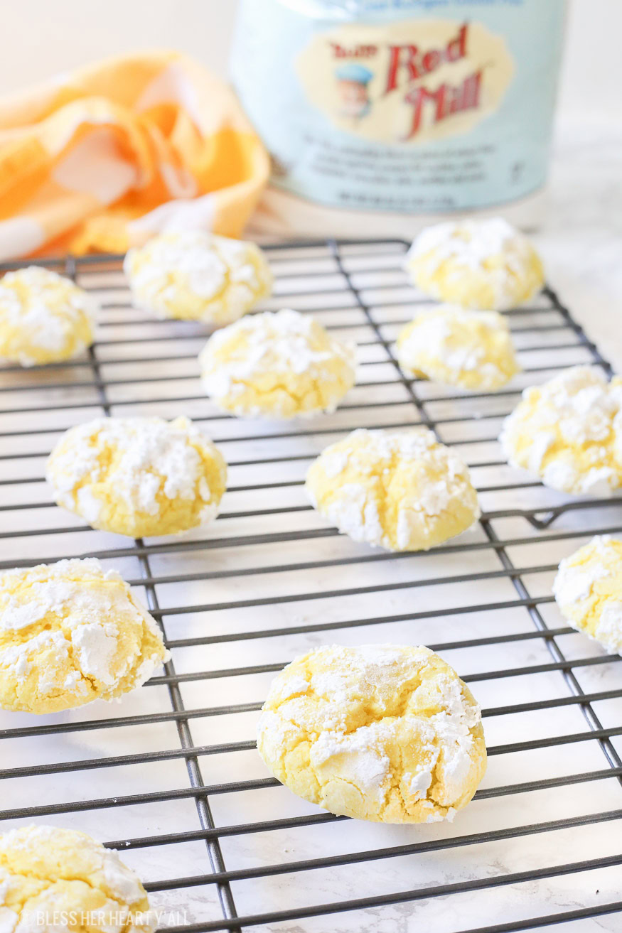 Gluten free lemon crinkle cookies combine light fresh lemon flavors into soft and doughy cookies that are sprinkled in delicious powdered sugar before being baked for a quick 10 minutes!