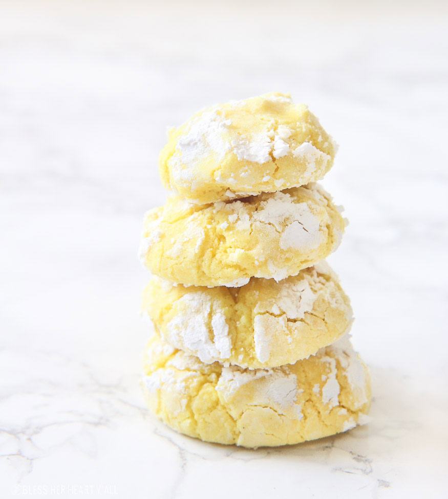 Gluten free lemon crinkle cookies combine light fresh lemon flavors into soft and doughy cookies that are sprinkled in delicious powdered sugar before being baked for a quick 10 minutes!