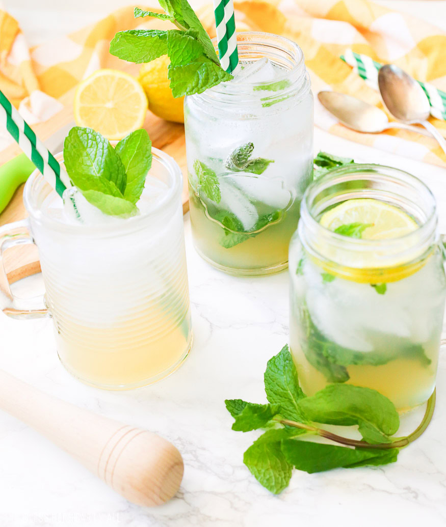 This lemonade mint julep recipe blends summer's most refreshing fresh squeezed lemonade and stirs it up into spring's hottest mint julep cocktail! Lemon, bourbon, mint, and sweet that's perfect for an outdoor party, watching the Kentucky Derby, or just a relaxing time outside on your back porch!