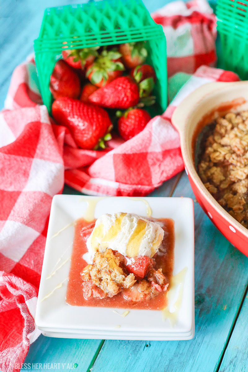 This gluten-free strawberry crumble warms sweet juicy strawberry pieces with a soft and sweet crisp topping. Perfect with vanilla bean ice cream and a drizzle of fresh honey!