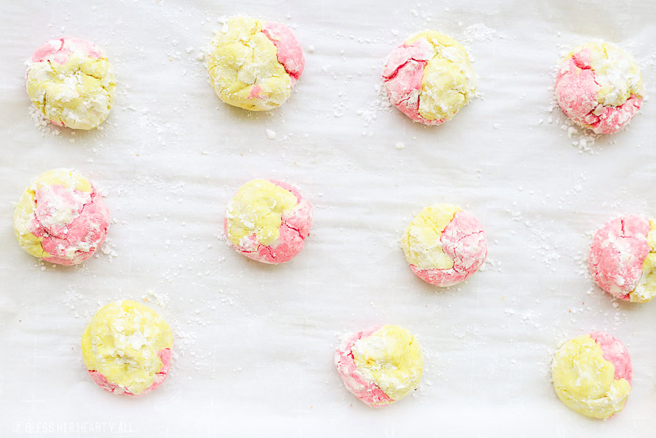 This strawberry lemonade cookie recipe combines zesty lemon flavors with sweet strawberry hints in a soft and fluffy crinkle cookie! These moist gluten free cookies are a great little snack or dessert all summer long! image 7