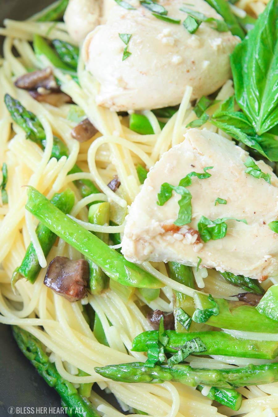 This chicken pasta in garlic basil butter sauce recipe makes for an easy gluten free dinner for busy weeknights. Pasta and chicken is tossed with the vegetables you already have in your kitchen and drizzled in a sizzling light and creamy garlic butter sauce with extra hints of basil and lemon! image 7