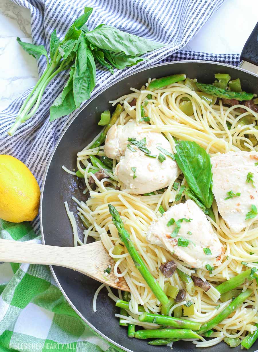 This chicken pasta in garlic basil butter sauce recipe makes for an easy gluten free dinner for busy weeknights. Pasta and chicken is tossed with the vegetables you already have in your kitchen and drizzled in a sizzling light and creamy garlic butter sauce with extra hints of basil and lemon! image 5