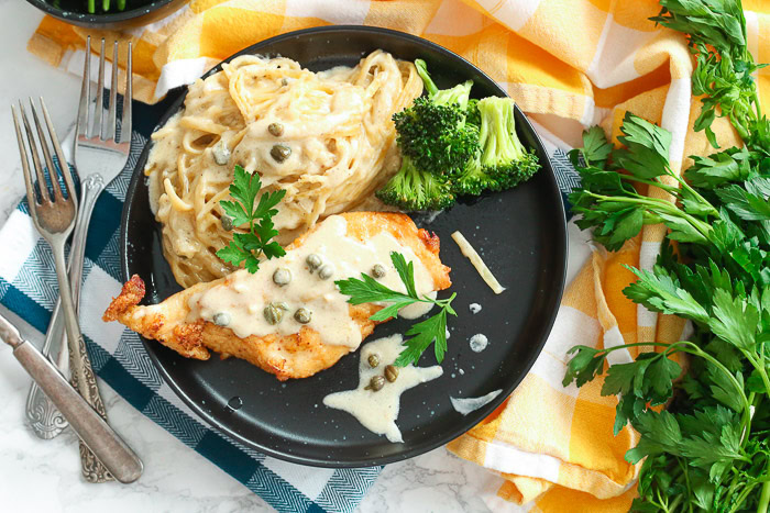 Gluten Free Chicken Piccata with Creamy Pasta in a plate 