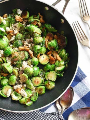 brussel sprouts and blue cheese in skillet pan