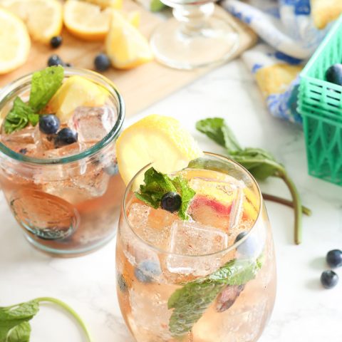 blueberry vanilla bourbon smash in cocktail glass