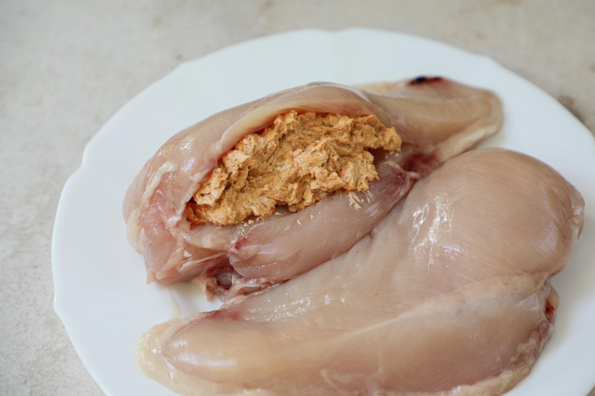 Stuffed chicken breast before cooking