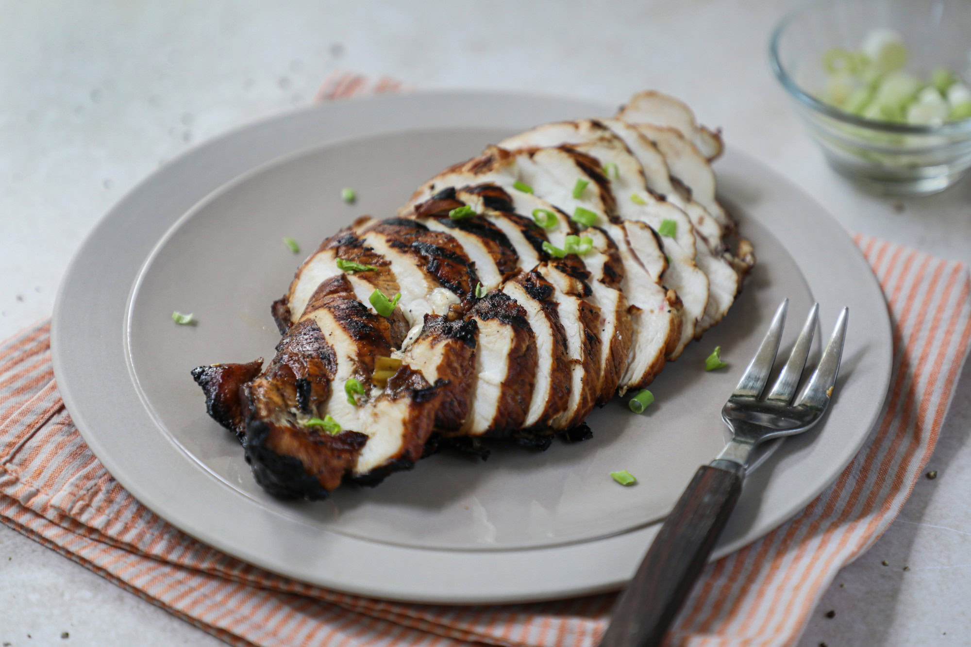 Sliced turkey on a gray plate