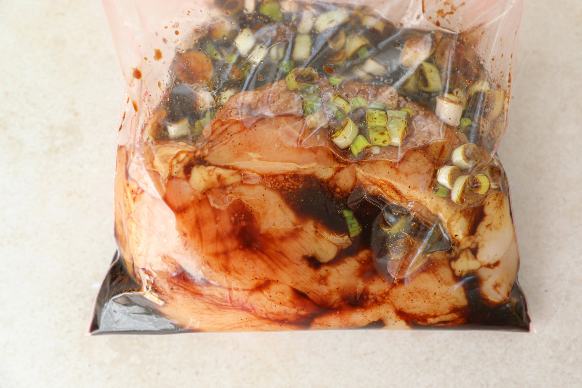 Turkey marinating in a ziploc bag