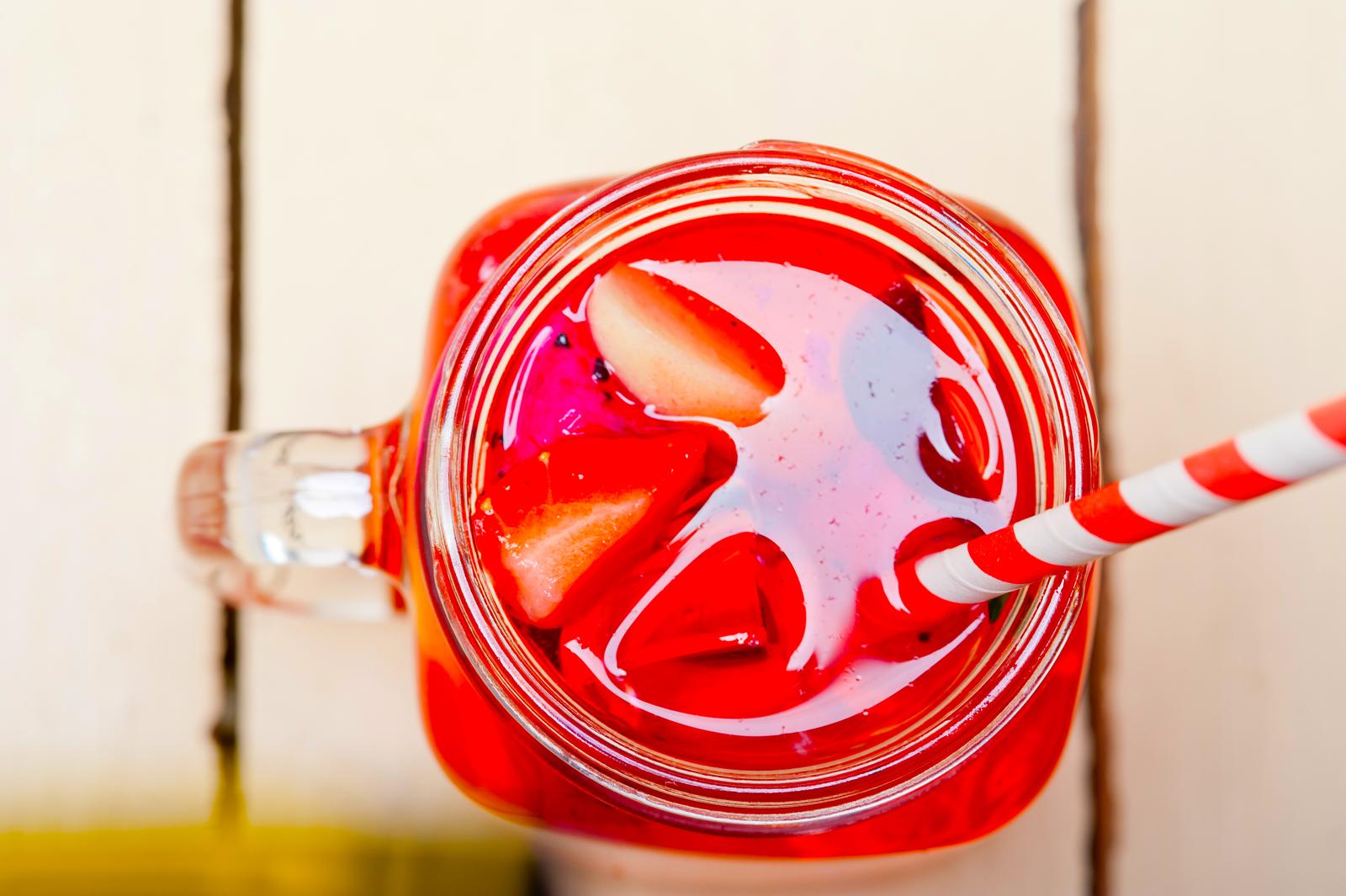 fresh fruit hunch punch over white rustic wood table